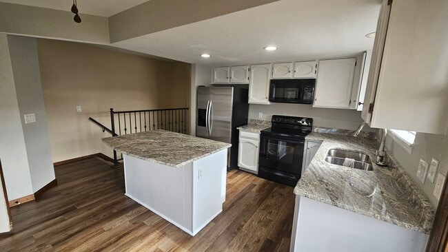 Photo - Spacious Townhome with Finished Basement i...