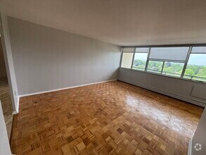 Building Photo - 1061 Queen's Blvd