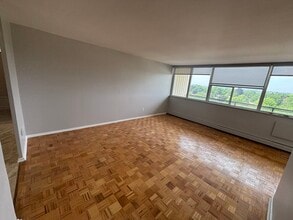 Building Photo - 1061 Queen's Blvd