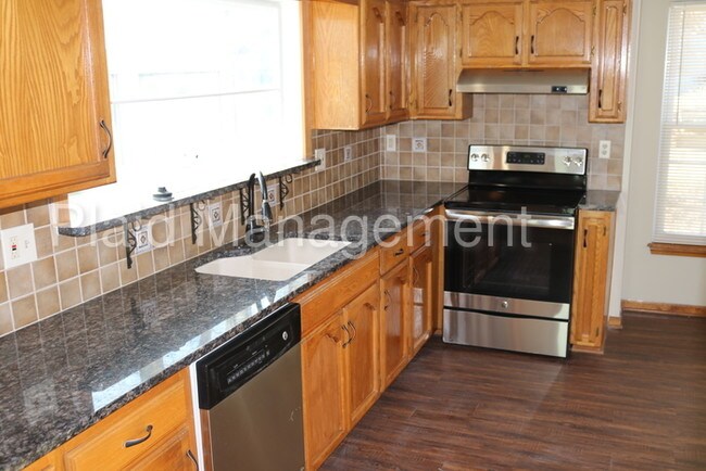 Building Photo - Finished basement and fenced backyard