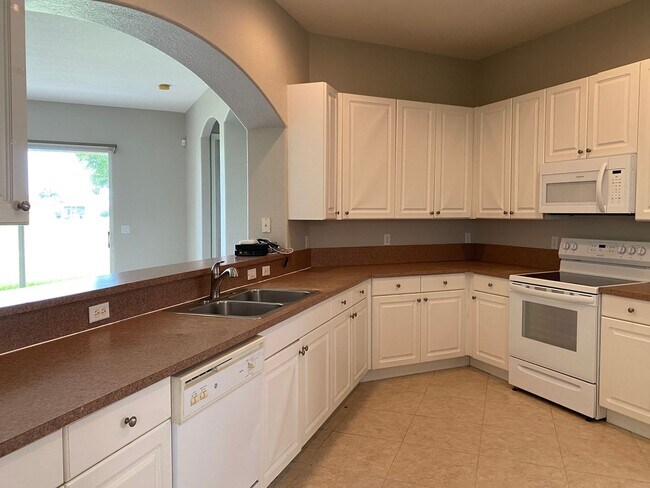 Building Photo - SPACIOUS 3/2 IN SAINT JAMES GOLF COMMUNITY