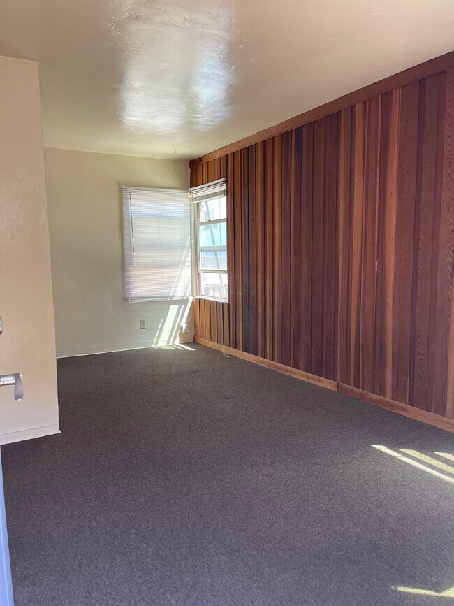 view across living room to dining room - 719 San Jose Plz