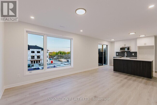 Building Photo - 15-801 GLENROY GILBERT DRIVE