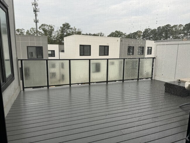 Building Photo - Furnished with Modern Class!
