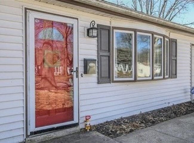 Building Photo - {5611} Updated OP Ranch + Two Car Garage + Fenced Yard and Stamped Concrete Patio Perfect for Spr...