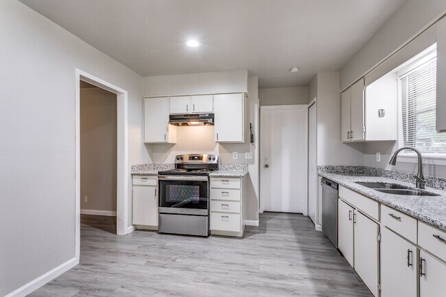 Building Photo - RENOVATED 4-BEDROOM IN CAMELOT, NORTH EAST...