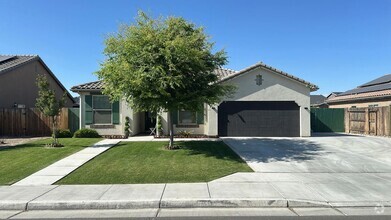 Building Photo - 5806 Blue Spruce Ave