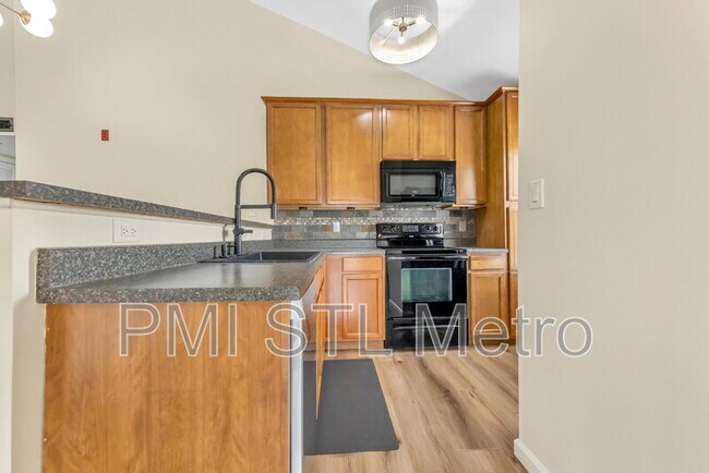Foto del edificio - 6303 Spring River Dr