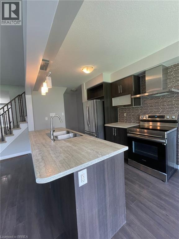 Photo du bâtiment - 111 Bisset Ave