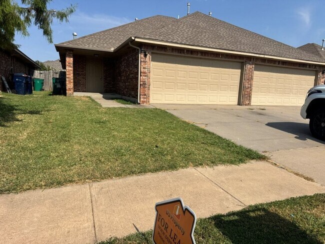 Building Photo - 3-bedroom duplex with new carpet in the bedrooms and a 2-car garage ready for move in!