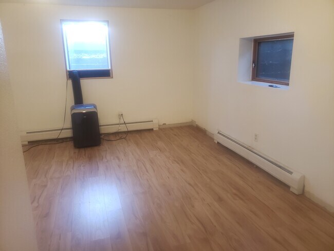 Bedroom attached to living room with walk in closet - 3121 S Downing St