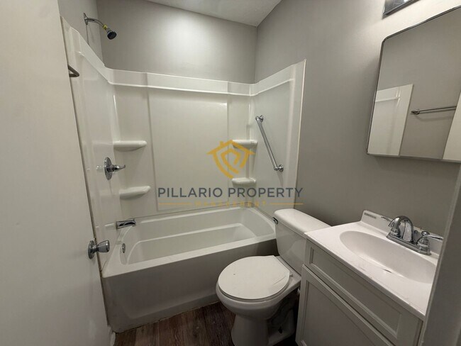 Building Photo - Charming 3-Bedroom Stone Bungalow with 2-Car Detached Garage & Fenced Yard, Available NOW!