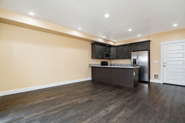 Building Photo - Marigold Apartments - Make Spirits Bright In Your New Apartment