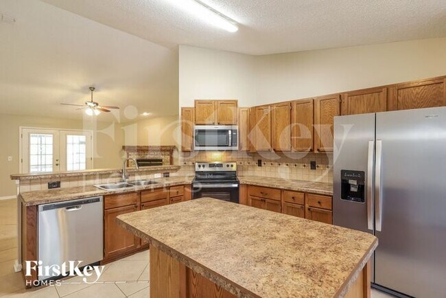 Foto del edificio - 8955 Needlepoint Place