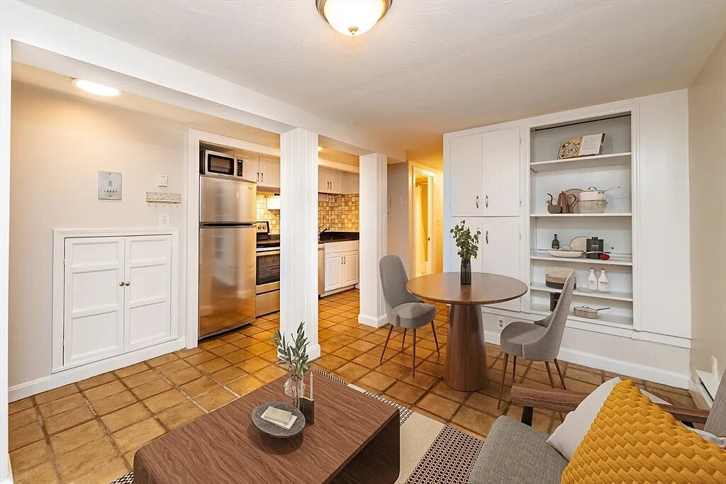 Photo - "Chic & Spacious 1BR Retreat with Movie Room & Central Vacuum at 9 Hancock St, Boston!"