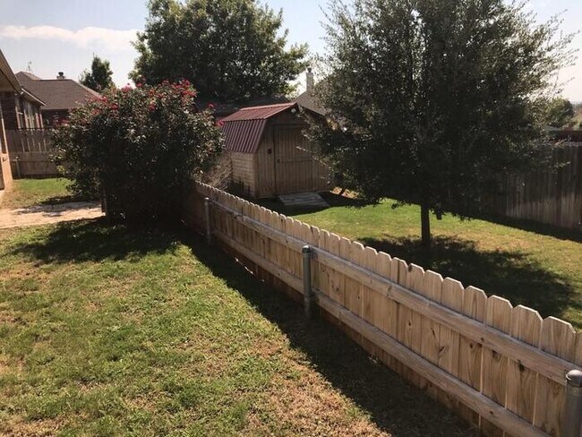 Building Photo - Meander Estates! Large corner lot 3/2/2 Coming August 2025. Covered patio!