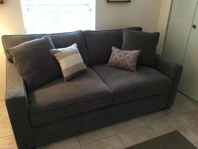 Foto del edificio - 2 br, 2 bath Condo - 7535 S Oriole Blvd Ap...