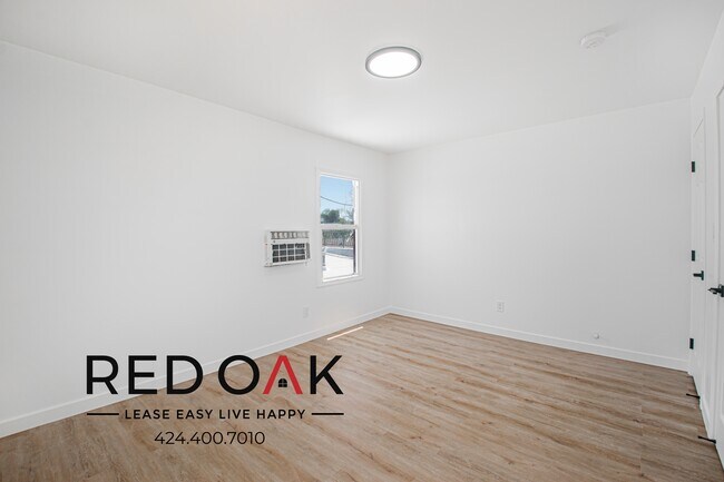 Building Photo - 1212 E 76th Pl