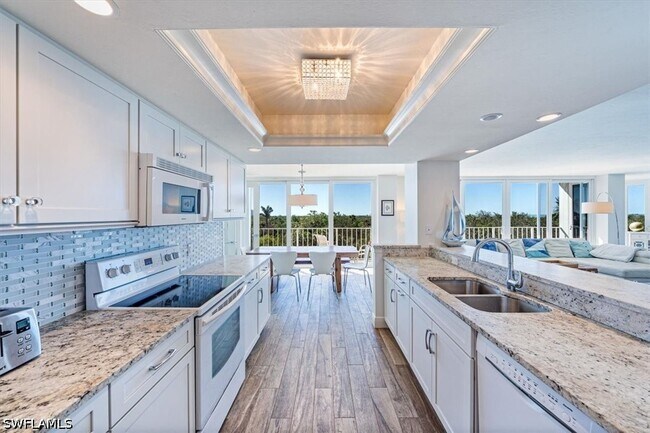 Building Photo - 6361 Pelican Bay Blvd
