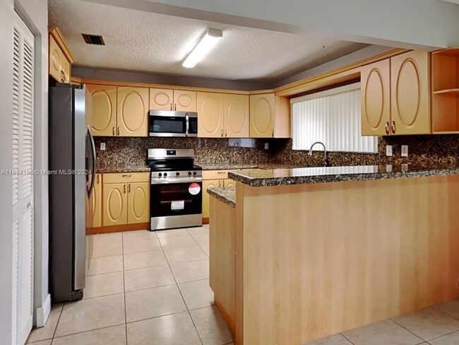 Building Photo - 11295 SW 55th Pl