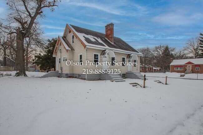 Building Photo - 1427 W 46th Ave