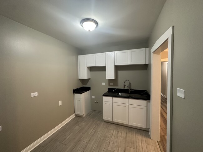 Building Photo - 849 N Laramie Ave