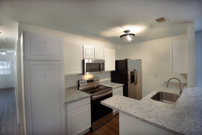 Building Photo - Recently Updated, and a FENCED Backyard!