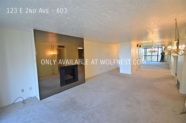 Building Photo - Stunning 2 Bed Downtown Condo! No Deposit ...