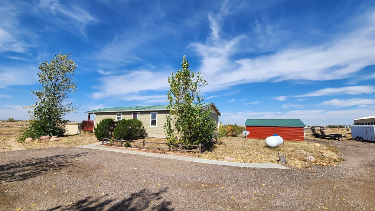 Primary Photo - 6 Bedroom Ranch Style Home with Finished B...