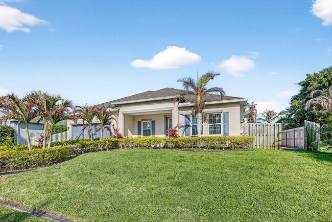 Photo - Modern 4-Bedroom Rental with Screened Patio & 2-Car Garage House