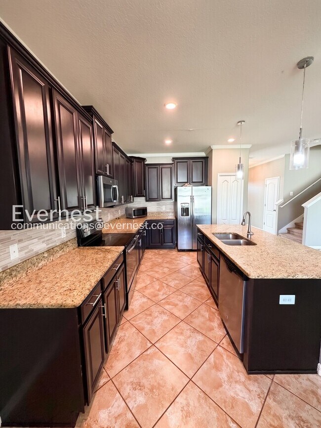Building Photo - 4 Bed & 3 Bath Home with Fenced Yard and Modern Amenities / Voucher Accepted / No Pets Allowed / ...