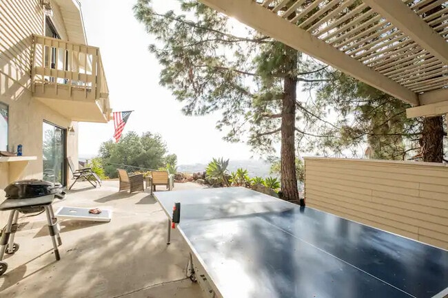 Building Photo - Hilltop 5BR Retreat w/ Sunset Views + Game Room