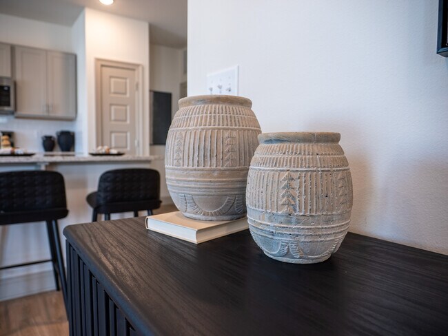 The Opal: 1BR, 1BA- Living Room - The Waters at Bluebonnet