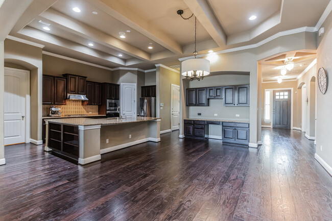 Entry foyer looking from living room, through kitchen - 5900 Lipan Apache Bnd