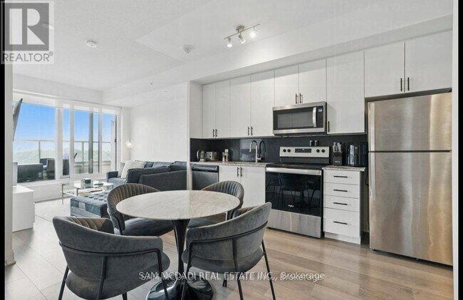 Photo du bâtiment - 3220-3220 Sheppard Ave E