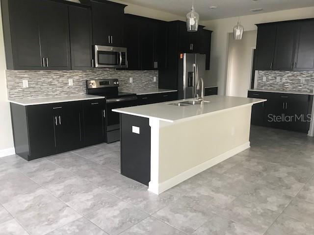 Foto del edificio - 15061 Evergreen Oak Loop