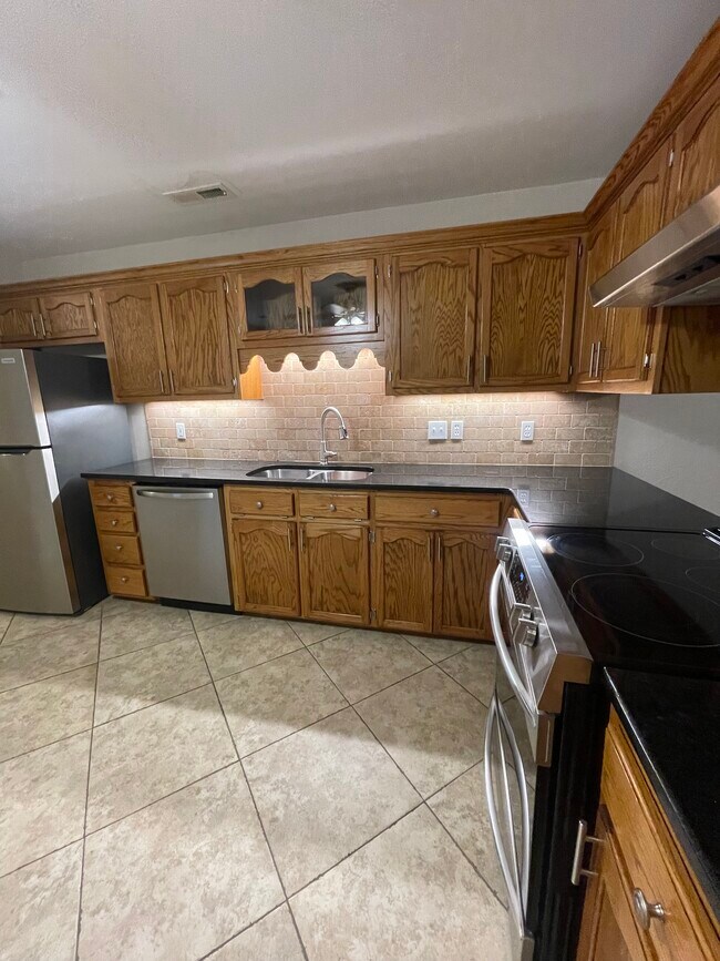 Kitchen has granite countertops - 5191 County Road 73