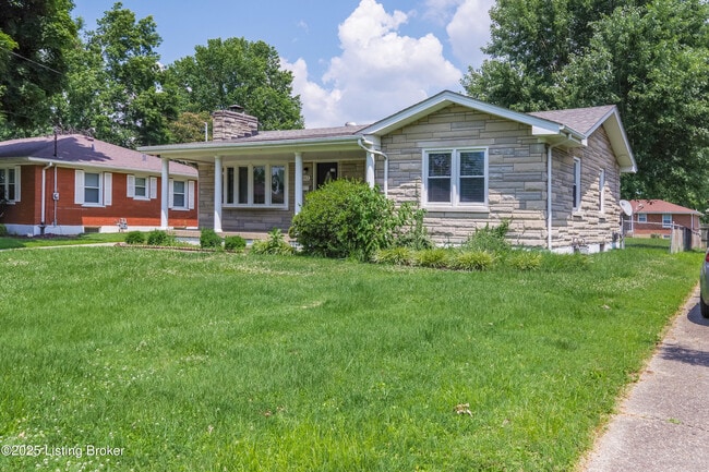 Building Photo - 8003 Canna Dr