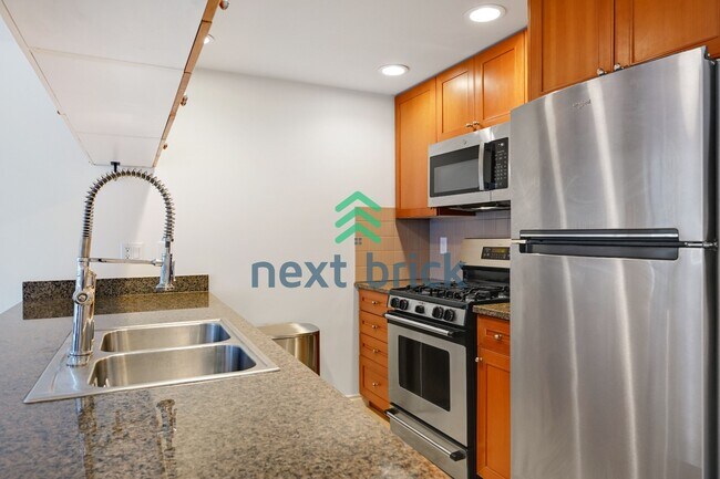 Foto del edificio - "Chic Urban Retreat: Stylish 1-Bedroom Condo in the Heart of Seattle!"