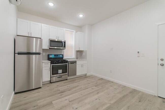 Building Photo - 5703 W Girard Ave