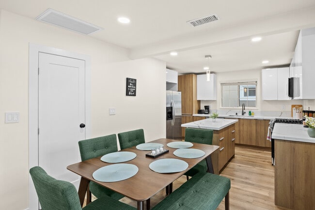 Building Photo - 6449 Woodlake Ave