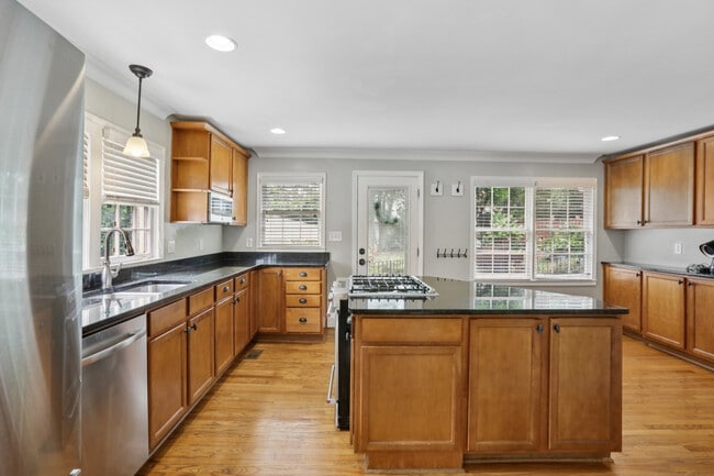 Large kitchen, tons of natural light and storage. - 781 Rosedale Ave SE House