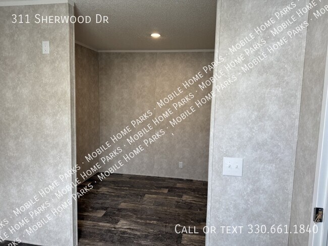 Foto del edificio - 311 Sherwood Dr