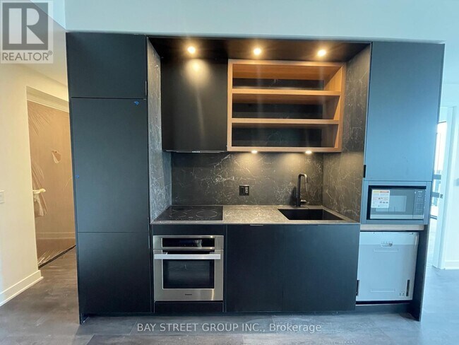 Building Photo - 55 Charles St E