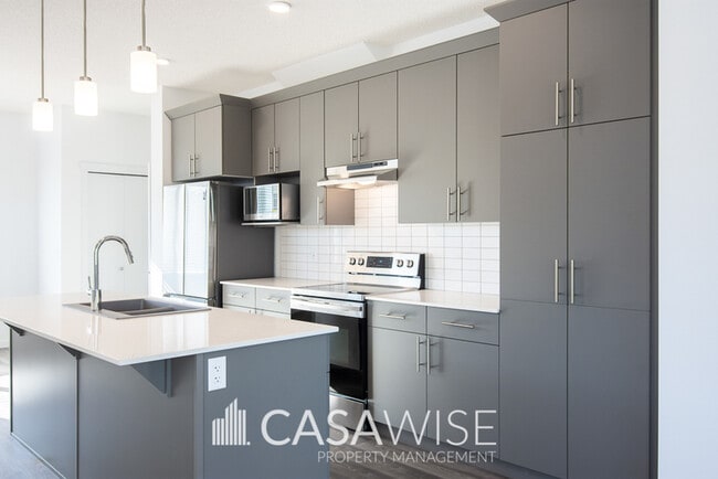 Building Photo - 1274 McConachie Blvd NW