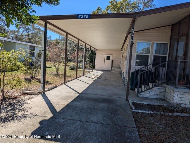 Building Photo - 7375 2nd Loop Ave