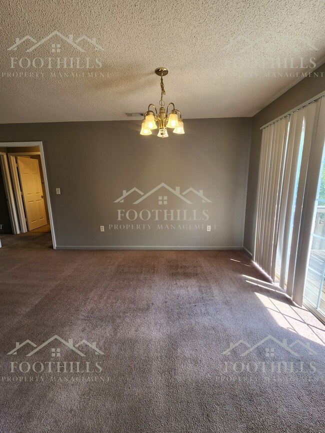 Building Photo - Refreshed & Ready! 3BR Home with Deck and ...