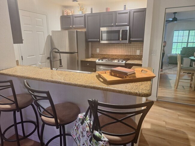 Building Photo - READY SET GO HOME!  TO THIS 3 BEDROOM 2 BATH CONDO! CALL LINDA PATTI 386.837.2882