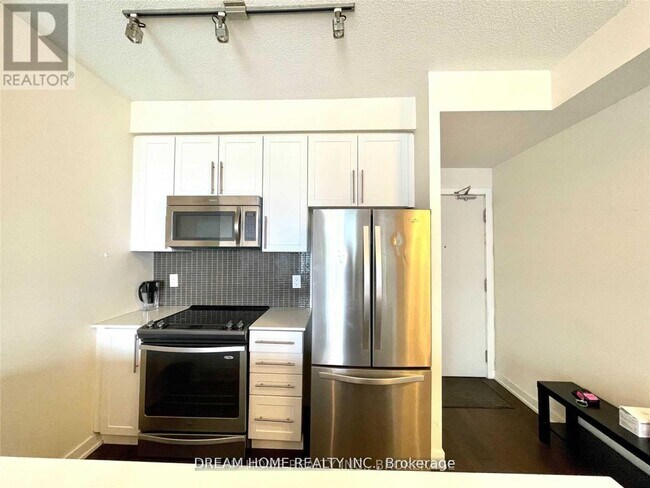 Building Photo - 326-4011-4011 Brickstone Mews