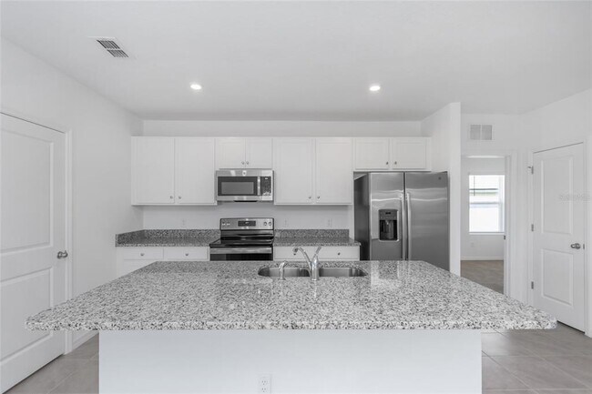 Foto del edificio - 6773 Branham Mill Ct